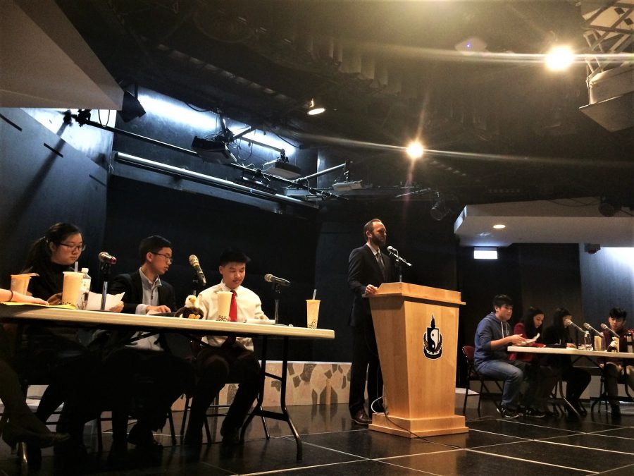National debate team conducts demonstration round with students
