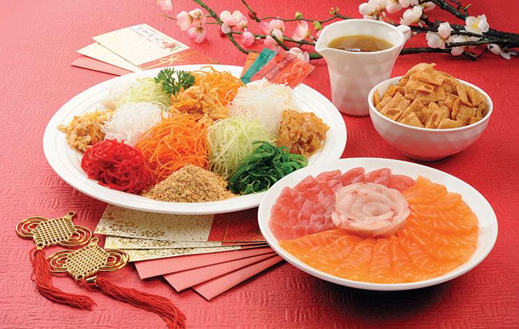 One of the most unique dishes Singapore boasts during Chinese New Year is “yu sheng.”  Photo courtesy of causewaybay.com.