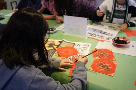 The Archivists hosted a calligraphy session in the library to celebrate Chinese New Year. [SHARON LEE/THE BLUE & GOLD]