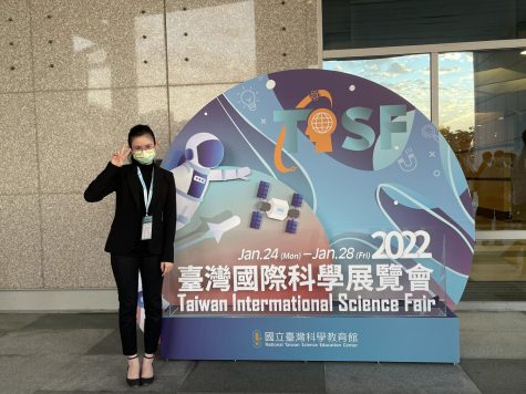 Veronica K. (‘23) poses for a photo at the Taiwan International Science Fair. “It really amazed me seeing everyone’s hard work,” she said.