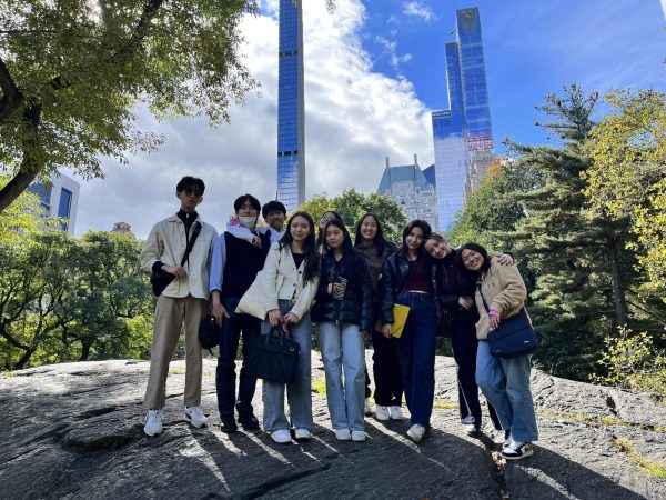 The film team poses for a group photo in Central Park. [ERIN WU/THE BLUE AND GOLD] 