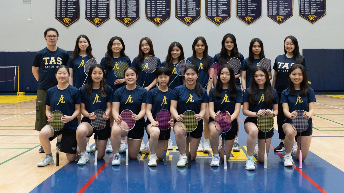 Photo of the girl's varsity badminton team [PHOTO COURTESY OF TAS ATHLETICS]