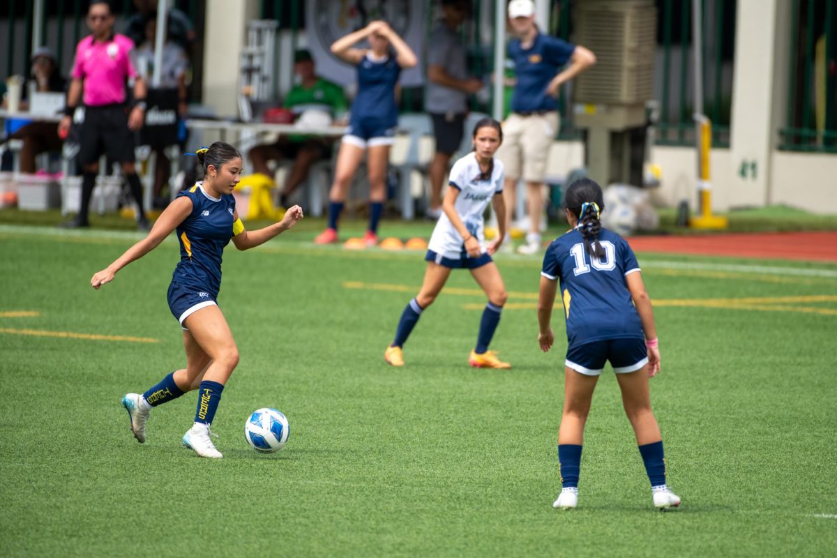 Aimee C. ('27) mid-kick. 
[Photo courtesy of ISM Athletics]