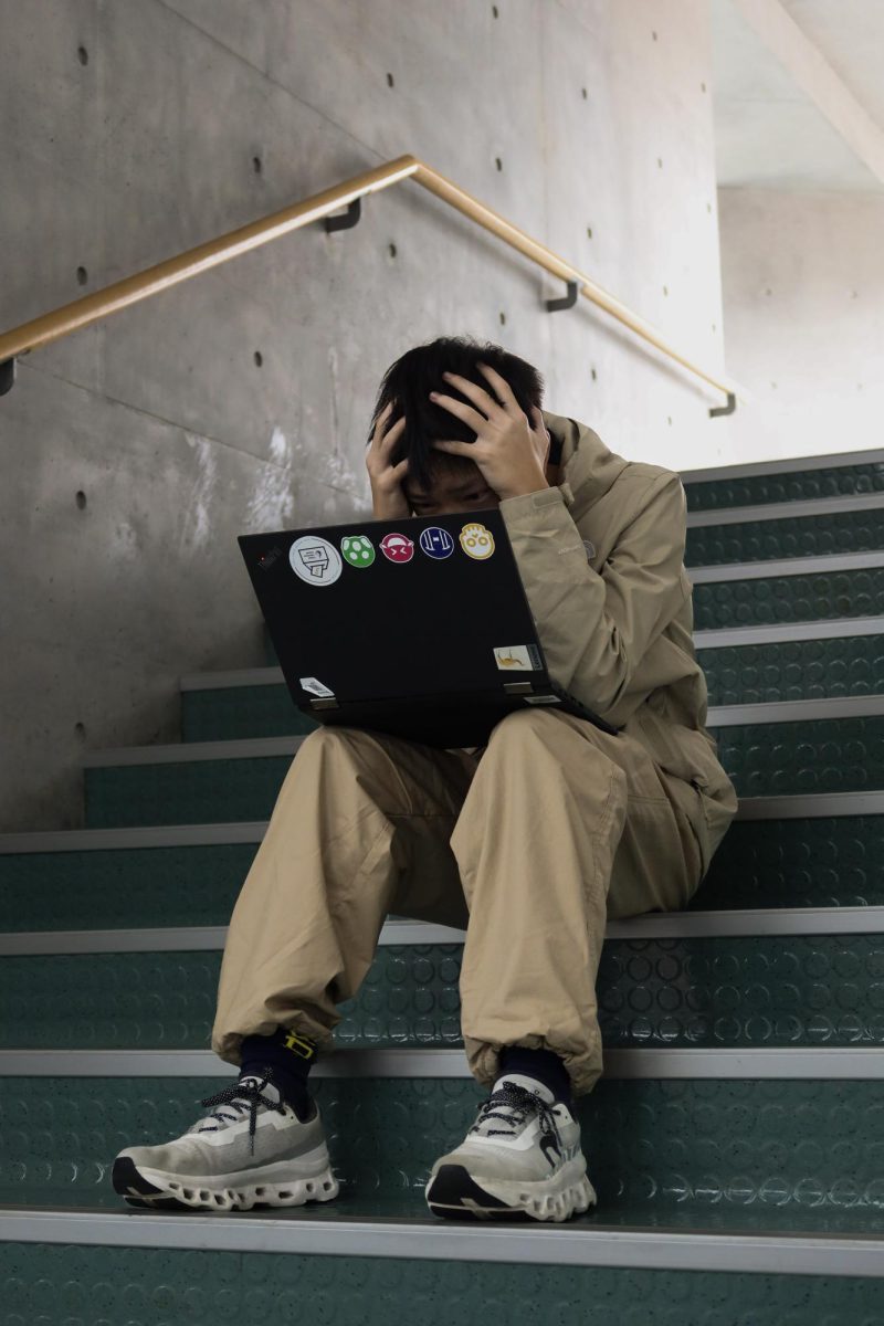 Student feeling stressed after being unsure of performance. [Ethan Lo/The Blue & Gold]