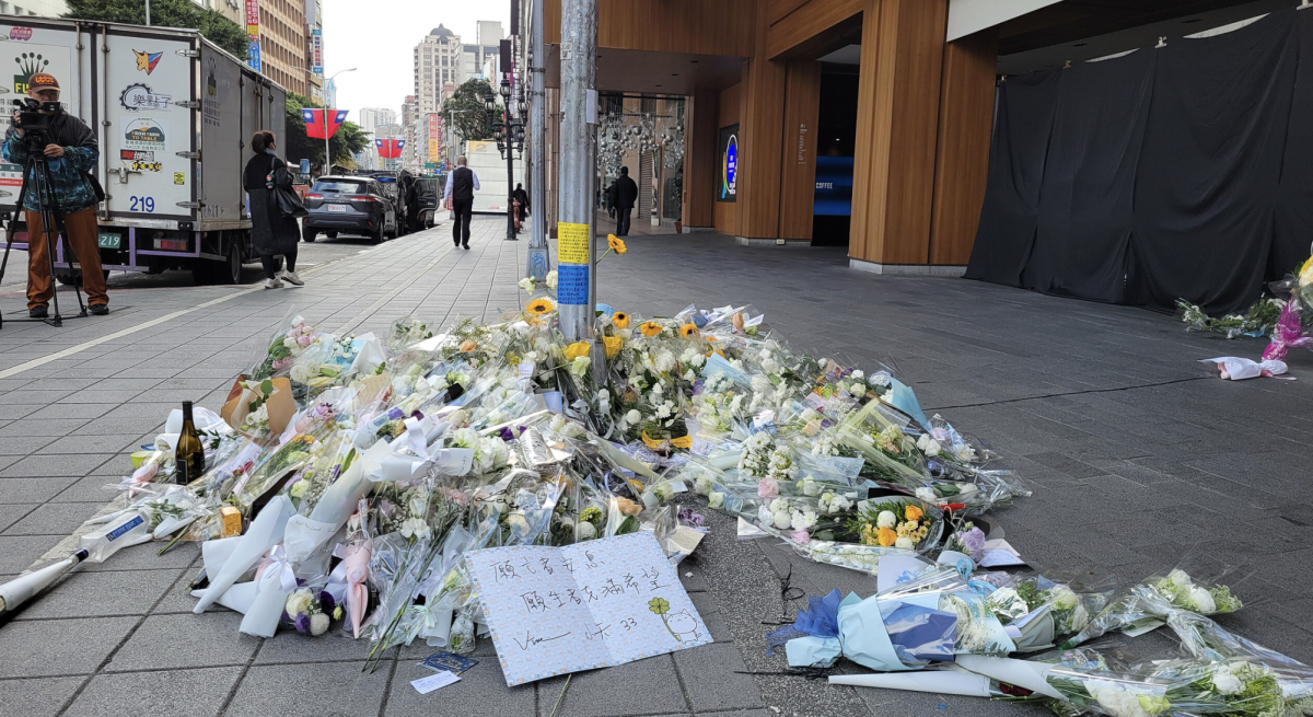 Flowers in memorial of the victims of the MRT stabbing. *see image license attached below
